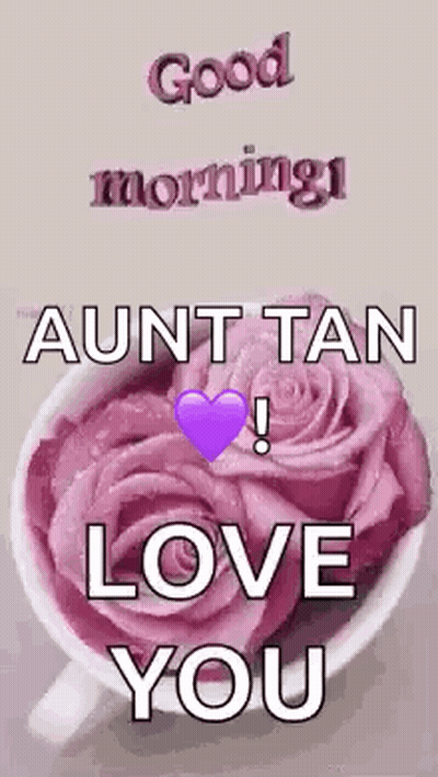 A Cup Of Pink Roses With A Purple Heart And The Words `` Good Morning Aunt Tan Love You '' GIF