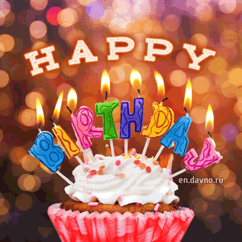 A Cupcake With Birthday Candles That Say Happy Birthday GIF