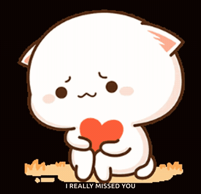A Cute Cartoon Cat Is Holding A Red Heart And Says I Really Missed You GIF