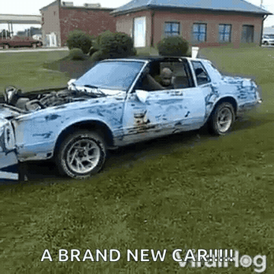 A Damaged Car Is Parked In A Grassy Field With The Words A Brand New Car GIF