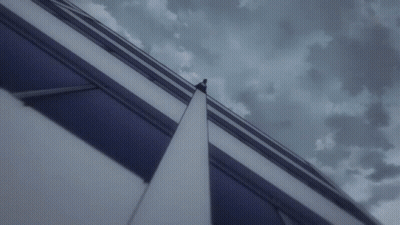 A Dark Background With A Few Clouds And A Few Plants In The Foreground GIF