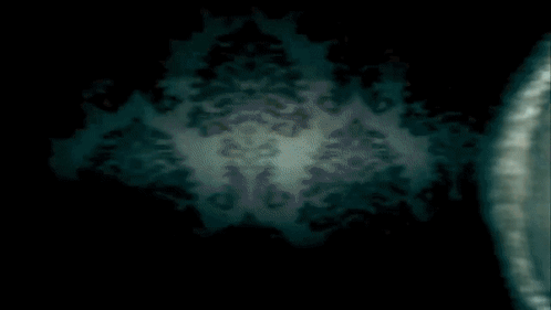 A Dark Background With A Floral Pattern And A Circle In The Middle GIF