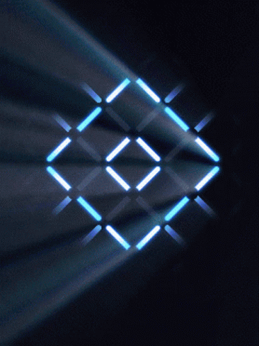 A Dark Background With A Grid Of Blue Squares And Lines GIF