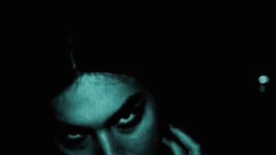 A Dark Background With A Light Coming Out Of The Middle GIF