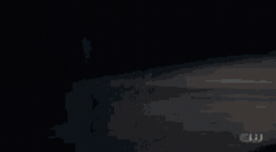 A Dark Background With The Letters Cw On The Bottom Right GIF