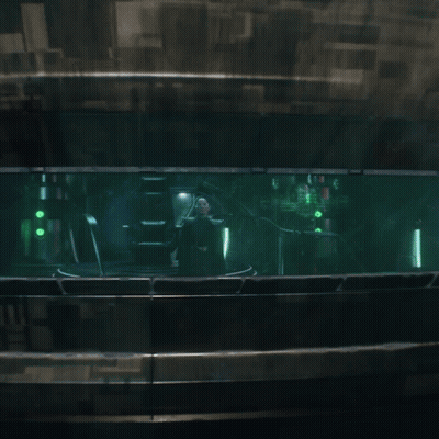 A Dark Room With A Green Light Coming Out Of The Window GIF