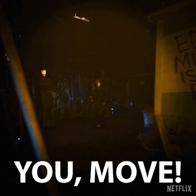A Dark Room With A Sign That Says You Move GIF