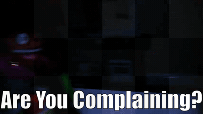 A Dark Room With The Words " Are You Complaining " On The Bottom GIF