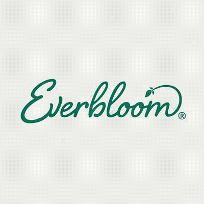 A Deck With A Table And Chairs Under An Umbrella With The Word Everbloom On The Bottom GIF