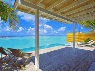 A Deck With Chairs And A Swimming Pool Looking Out To The Ocean GIF