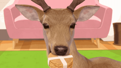 A Deer Holding A Stack Of Crackers In Front Of Its Face GIF