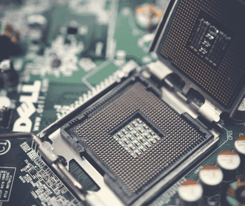 A Dell Computer Motherboard With A Cpu In It GIF