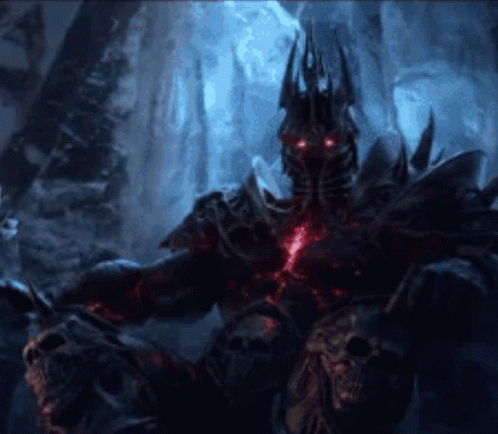 A Demon With Red Eyes And A Crown Is Sitting On A Rock In A Cave . GIF