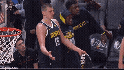 A Denver Nuggets Basketball Player Talks To Another Player GIF