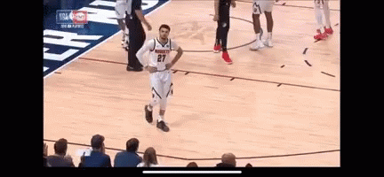 A Denver Nuggets Player Stands On The Court During A Basketball Game GIF