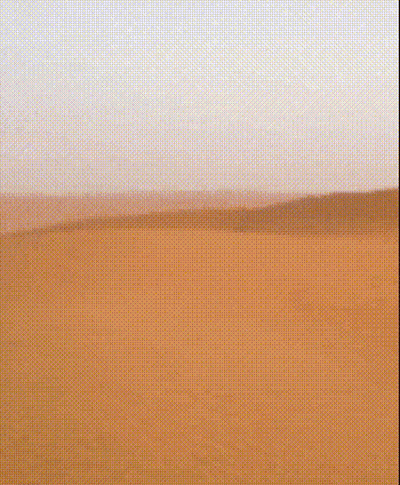 A Desert Landscape With A Grid Pattern And A Blue Sky In The Background GIF