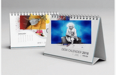 A Desk Calendar For The Year 2018 Has A Picture Of A Man On It GIF