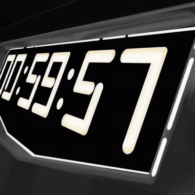 A Digital Clock Reads 00:59:57 On A Black Background GIF