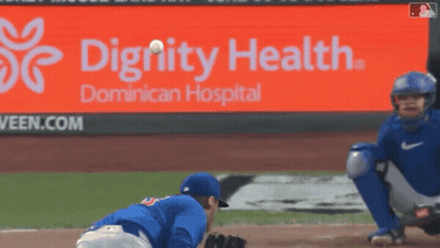 A Dignity Health Ad Is Behind A Baseball Player GIF