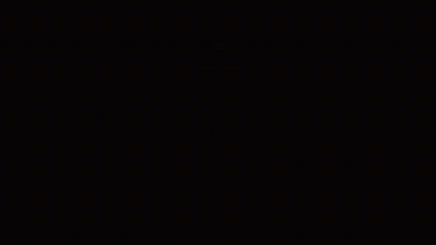 A Dimly Lit Hallway With A Sign That Says ' Exit ' On It GIF