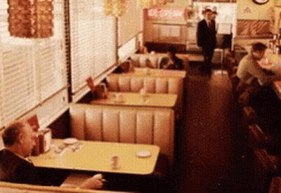 A Diner With A Sign That Says Ice Cream In The Back GIF