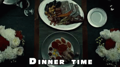 A Dinner Table With Two Plates Of Food And The Words Dinner Time On The Bottom GIF