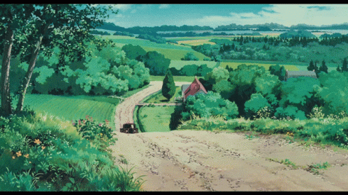 A Dirt Road Leads To A House In The Middle Of A Field GIF