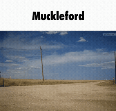 A Dirt Road With The Word Muckleford On The Top GIF