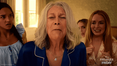 A Disney Freakier Friday Advertisement Features A Woman In A Blue Pajamas GIF