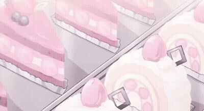 A Display Case Filled With Pink And White Cakes And Pastries . GIF