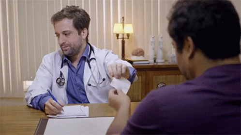 A Doctor Is Giving A Patient A Piece Of Paper To Sign GIF