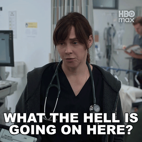 A Doctor With A Stethoscope Around Her Neck Says What The Hell Is Going On Here GIF