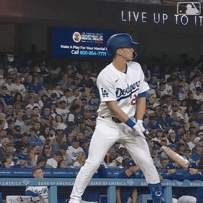 A Dodgers Baseball Player Getting Ready To Swing At A Pitch GIF