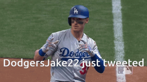 A Dodgers Baseball Player Runs Towards Home Plate GIF