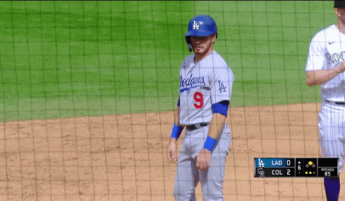 A Dodgers Baseball Player Wearing Number 9 Stands On A Field GIF