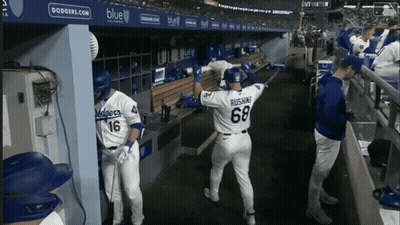 A Dodgers Player With The Number 68 On The Back Of His Shirt GIF