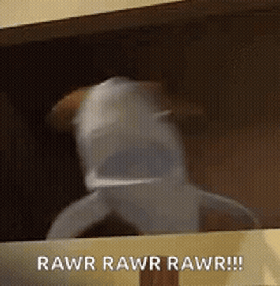 A Dog In A Shark Costume Is Looking Out Of A Window And Saying Rawr Rawr Rawr . GIF