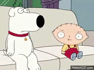 A Dog Is Sitting On A Couch Next To A Baby . GIF
