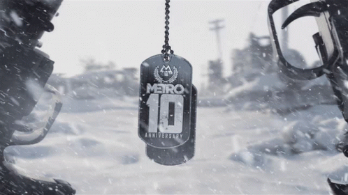 A Dog Tag That Says Metro 10 Anniversary On It GIF