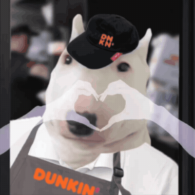 A Dog Wearing A Dunkin ' Donuts Apron Making A Heart Shape GIF