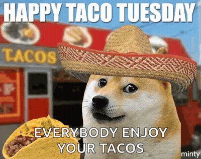 A Dog Wearing A Sombrero Is Holding A Taco In Front Of A Taco Truck GIF
