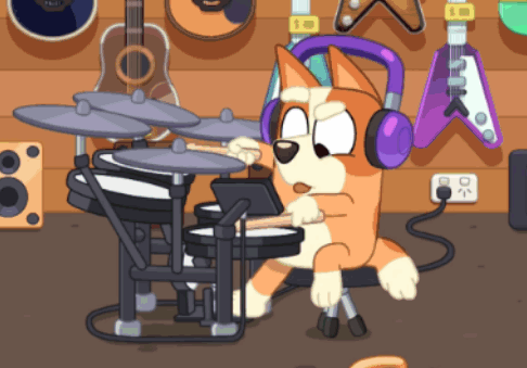 A Dog Wearing Headphones Plays Drums In Front Of Guitars GIF
