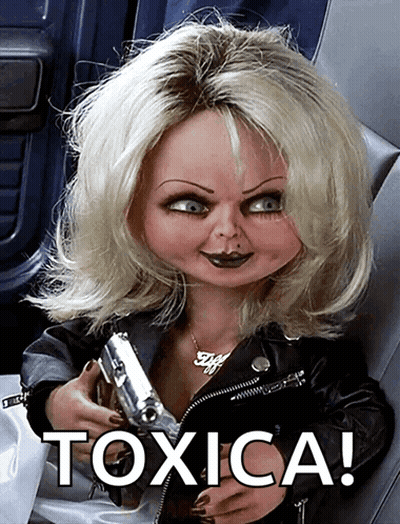 A Doll Is Holding A Gun And The Words Toxica Are Below Her GIF