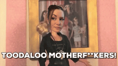 A Doll Is Standing In Front Of A Painting And Says `` Toodaloo Motherf**kers '' . GIF