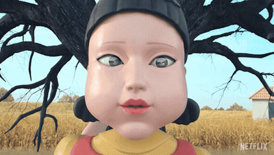 A Doll With A Netflix Logo On The Bottom Right GIF