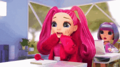 A Doll With Pink Hair Is Sitting At A Desk In A Classroom . GIF