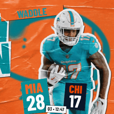 A Dolphins Football Player Named Waddle Is Running With A Ball GIF
