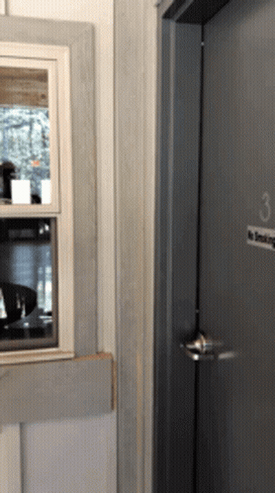 A Door With The Number 3 On It And A No Smoking Sign GIF
