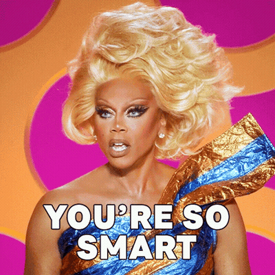 A Drag Queen Says " You 'Re So Smart " In Front Of A Purple Background GIF