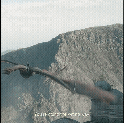 A Dragon Flying Over A Mountain With The Words You 'Re Going The Wrong Way GIF